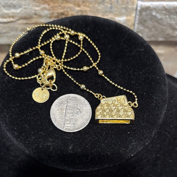 Elegant Gold Purse Pendant Necklace - Picture 7 of 7